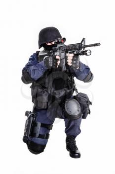 Special weapons and tactics (SWAT) team officer with his gun
