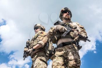 United States Army rangers with assault rifles