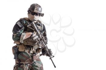 United states Marine Corps special operations command Marsoc raider with weapon. Studio shot of Marine Special Operator white backgroun