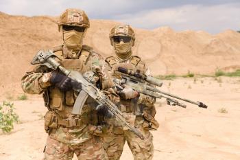 Portrait of two special forces soldiers during military operation