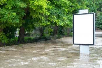 Vertical blank billboard on the city street