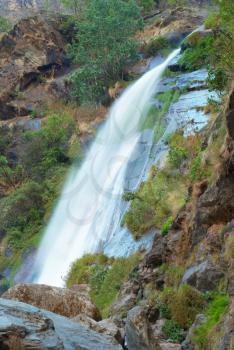 Beautiful high tibetan waterfall in the mountains