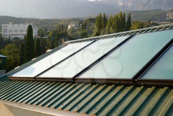 Solar panels (geliosystem) on the house roof.