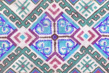 Embroidered handmade cross-stitch ethnic Ukraine pattern, stylized as watercolor. Ethnic ornament.