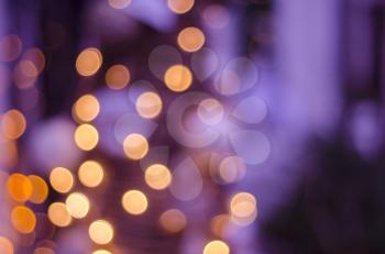 Abstract bokeh blurred color light background. Blur lights for Christmas, party, holiday wallpaper. Defocused lights.