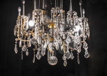 Crystal chandelier of the Baroque epoch. Church decoration and illumination