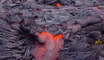 Current lava on the surface of the earth. Liquid lava.