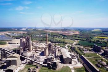 Large cement plant. The production of cement on an industrial scale in the factory.