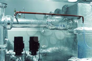 Thermal insulation of a pipes with foil.