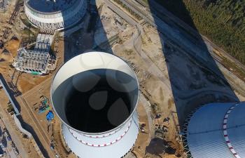 Aerial survey of a nuclear power plant under construction. Installation and construction of a power plant. Nuclear power.