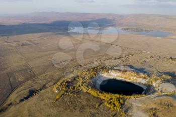 Ore production in the earth's crust. Filled with water mine workings