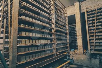 The brick is raw. Move raw bricks to the kiln. Brick production, hollow ceramic bricks factory. Brick production, bricks factory.