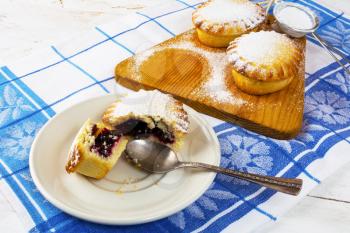 Sweet pie on the cutting board. Jam pie. Small pie. Pie. Sweet dessert . Sweet pastry. 