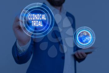 Handwriting text Clinical Trial. Conceptual photo trials to evaluate the effectiveness and safety of medication Elements of this image furnished by NASA