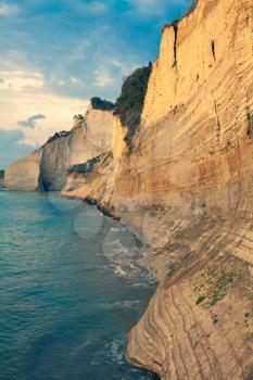 Sedimentary Rock Cliff at the sea, Limestone Natural Structure Coast, Mointain Chain of Layered Stone Formation along the Beach High Shoreline Eroded Crag 