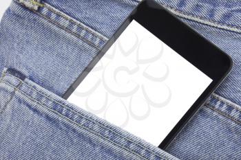 Smartphone in the back pocket of the jeans. Empty white screen of the device. Copy space on the touch screen of the mobile phone. Holding mobile phone in the pocket