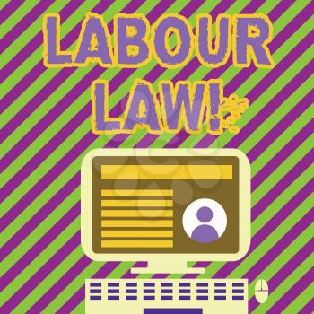 Handwriting text writing Labour Law. Conceptual photo rules relating to rights and responsibilities of workers Desktop Computer Mounted on Stand with Online Profile Data on Monitor Screen