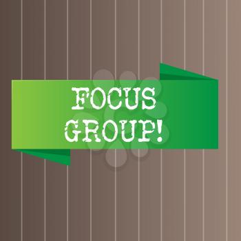 Text sign showing Focus Group. Business photo text showing assembled to participate in discussion about product Blank Folded Color Banner photo on Vertically Striped Two Toned Backdrop
