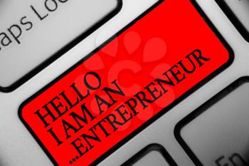 Writing note showing Hello I Am An ...Entrepreneur. Business photo showcasing person who sets up a business or startups Keyboard red key Intention computer computing reflection document