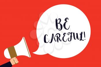 Handwriting text Be Careful. Concept meaning making sure of avoiding potential danger mishap or harm Man holding megaphone loudspeaker speech bubble screaming red background