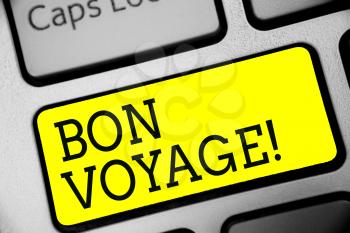 Text sign showing Bon Voyage. Conceptual photo used express good wishes to someone about set off on journey Keyboard yellow key Intention create computer computing reflection document