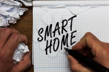 Text sign showing Smart Home. Conceptual photo automation system control lighting climate entertainment systems Man holding marker notebook crumpled papers ripped pages mistakes made