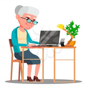 Elderly Woman Sitting At Table And Working With Laptop Vector. Illustration