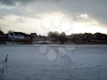 The lake frozen in winter, ice