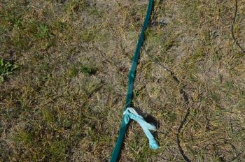 Installing a vibration pump in a water well