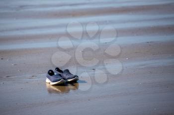 Abandoned shoes on Broad Haven beach