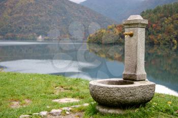 Water fountain by Lago d'Idro in Brescia Italy