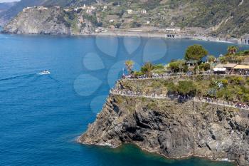 MANAROLA, LIGURIA/ITALY  - APRIL 20 : View of the coastline at Manarola Liguria Italy on April 20, 2019. Unidentified people