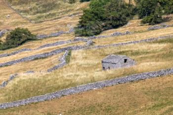 CONISTONE, YORKSHIRE/UK - JULY 27 : View of a derelict stone barn near Conistone in Yorkshire on July 27, 2018
