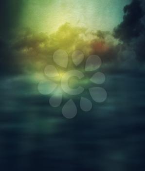 Colorful grunge texture with soft water surface and clouds.