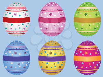 Colorful decorative Easter eggs on light blue background.