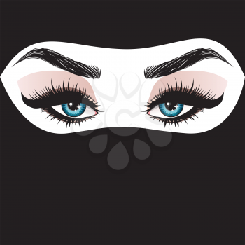 Blue female eyes with long eyelashes in black hijab.