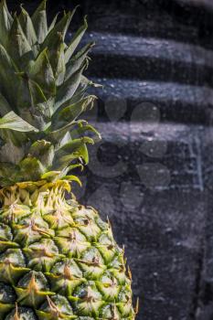 Detailed macro of big ripe pineapple background.