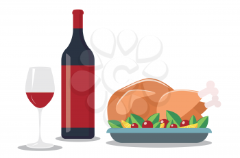 Tasty roasted turkey or chicken with vegetables on a plate and glass of red wine, traditional holiday dinner.