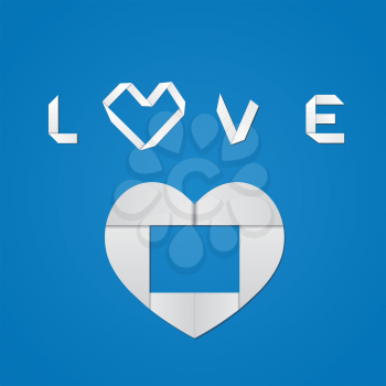 White origami paper heart and love word on blue background.