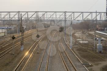 Top view to railway track at the train station in the morning.