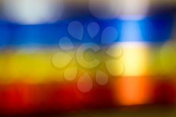 Defocused background of red, yellow and blue colors.