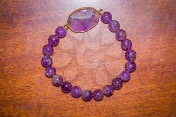 Fashion bracelet made of natural purple amethyst beads.