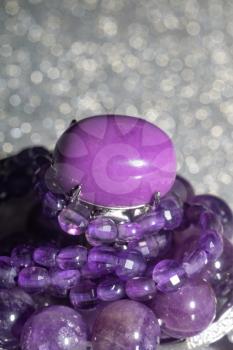 Fashion silver rings, bracelets and necklaces with purple amethysts and phosphosiderite stone.