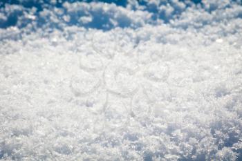 Macro photo of snowdrift after snowfall, winter background.