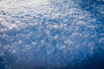 Macro photo of snowdrift after snowfall, winter background.