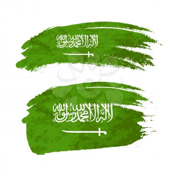 Grunge brush stroke with Saudi Arabia national flag isolated on white