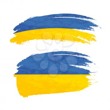 Grunge brush stroke with Ukraine national flag isolated on white