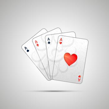 Winning poker hand of four aces on white
