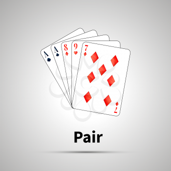 Pair poker combination with shadow on gray