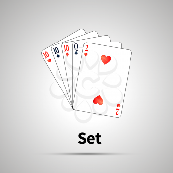 Set poker combination with shadow on gray